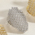 Detailed close-up of full zircon paved geometric rings in silver and gold finishes - Long Zirconia Style White Gold