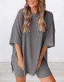Detail of grey two-piece lounge set showing oversized t-shirt and shorts in soft knit fabric - XS / Top And Bottom / Light Gray