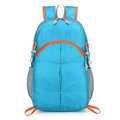 Foldable lightweight hiking backpack in bright blue with orange contrast zippers - 20-35L / Light Blue