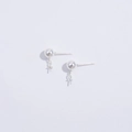 Macro view of S925 sterling silver ball stud earrings with hanging loop accessories - Silver Stud Accessory