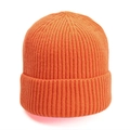 Detail view of bright orange ribbed knit beanie with soft texture and wide folded cuff - Orange