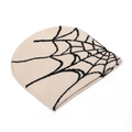 Close-up of cream knit beanie featuring a black spider web jacquard pattern detail - Beige and Black (E)