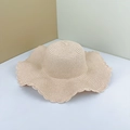 DIY beige wide-brim straw hat with wavy edges for sun protection and beach use - Pink