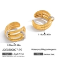 Macro view of two-tone stainless steel ear cuffs with gold and silver ripple design - Triple Layer Wave Dual Tone Ear Cuff (JDE0309007-PS)