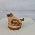 Macro shot of hand-carved wooden sparrow craft with white spots on natural log base - 29-Brown White Spotted Sparrow (With Base)