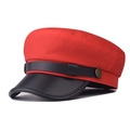 Detail of red fabric baker boy hat featuring a black leather brim and metallic buckle - M (56-58cm) / Cotton Red