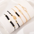 Set de 5 pulseras en oro y negro con dijes de corazón, hoja y símbolo de infinito - Negro (Juego de 4 piezas)