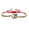 Adjustable evil eye charm bracelet with golden beads and red braided cord for women - Copper Beads Red Rope