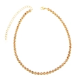 Detail of gold-plated tennis necklace with round red zircon stones and lobster clasp - Orange