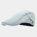 Detailed close-up of light blue denim flat cap with adjustable metal side buckle - Adjustable / Light Blue