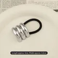 Minimalist silver alloy hair tie with triple metal accents and black elastic band - Triple Layer Arc Silver