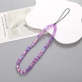 Detail of purple iridescent heart-shaped beads on a short wrist strap mobile lanyard - Mermaid Purple