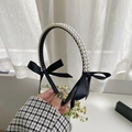 Elegant white pearl headband with black ribbon bow in a refined Korean braided style - 220407 Pearl Black