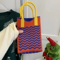 Knitted mini tote bag with orange and blue zigzag pattern and yellow handle - Wave Pattern Black Orange
