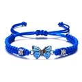 Handmade woven couple bracelet featuring a blue butterfly charm with sparkling rhinestones - Blue