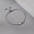 Detailed macro shot of adjustable silver box chain featuring a hollow pineapple charm - Silver Pineapple