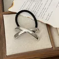 Punk style hair tie with a silver X-shaped alloy metal charm on black elastic band - GD441 Silver Smooth Cross