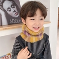 Cozy knit children's snood scarf in yellow and purple plaid pattern on child model - Yellow Purple Checkered