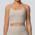 Close-up detail of light grey yoga bra with thin straps and seamless high-stretch fabric - S / Tops / Camel Brown