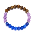Detailed view of elastic bead bracelet with brown tiger eye, purple, and blue beads - Tiger Eye / Purple / Blue