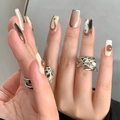 Long square press-on nails with beige marble patterns and silver gemstone rings - HY302 Ink Marble 3D Drop