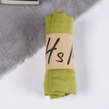 Grass green cotton linen scarf rolled with a kraft paper band and HS branding logo - Autumn Green / One Size