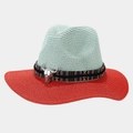 Detail of turquoise and red woven straw hat with tribal band and silver bull skull ornament - Green With Red Brim