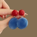 Detail shot of red resin stud earrings with blue circular teardrop pendants - 3# Silver Pin - Red & Blue (HE28657)