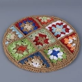 Detail showing colorful bohemian crochet patterns on a handmade woven beret hat - M (56-58cm) / Khaki