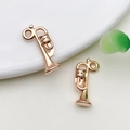 Set of two rose gold small musical instrument pendants for DIY necklaces and bracelets - 1 Piece (9x19mm)