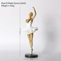 Modern gold and white ballet dancer sculpture in elegant pose with black base - Ballet Girl Statue - Gold Style B