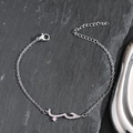 Detailed view of silver Arabic script bracelet with pink zircons and adjustable clasp - Platinum Plated - Pink Zirconia