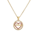 Elegante collana MOM placcata oro con ciondolo a cuore e cristallo rosa in luce studio - Cornice Rotonda Cuore Rosa MOM