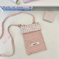Detail view of pink plaid mini phone bag with heart quilting and adjustable shoulder strap - Quilted Heart Pink / Pink Plaid