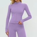 Veste de yoga lilas ajustée avec poche zippée et passe-pouces pour la course à pied - Lilas