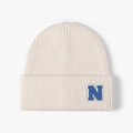 Creamy white ribbed knit beanie featuring a blue and white letter N patch on the cuff - Off White