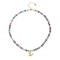 Bohemian beaded necklace with a golden bubble letter L pendant on white background - Letter V