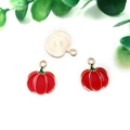 Macro view of gold-plated pumpkin pendants with red enamel finish for jewelry making - Enamel Pumpkin (15502) / 1 Piece/Pack (15x17mm) / Red