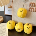 Set of 4 handmade yellow cantaloupe wool felt keychains with cute smiley faces - Melon Collection