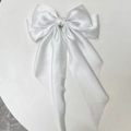 Elegant white satin hair clip with long streamers and double-layered bow design - Pure White