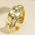 Detail shot of the 14K gold plated brass ring featuring polished round rivet studs - Multiple Beads Ring