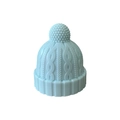 Light blue knitted hat style silicone wine stopper with fine texture and pompom top - Light Blue