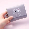 Light purple trifold wallet with cute cat cartoon design and floral keychain charm - Purple