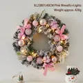 40cm pink Christmas wreath with artificial snow, bows, LED lights, and ornaments - 40cm Pink Wreath With Lights