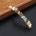 Close-up of golden hair clip with irregular colorful natural crystal stones - Mixed Stone Gold