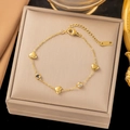 Golden stainless steel heart bracelet with round black and white gemstones on jewelry box - Black and White Diamond Heart - Gold