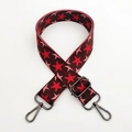 Detail of star pattern wide woven strap with dark gunmetal swivel lobster clasps - Coffee Base Red Star Gunmetal Buckle