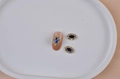 Oval blue gemstone nail art charm with gold plating and sparkling zircon border - Gold Edged Blue Oval Gemstone