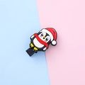 Cartoon penguin hair clip with red Santa hat and scarf on a blue and pink background - Penguin