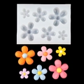 White silicone mold for DIY flower fondant and resin with colorful finished samples - B335 (6-Cavity Flower) / Clear